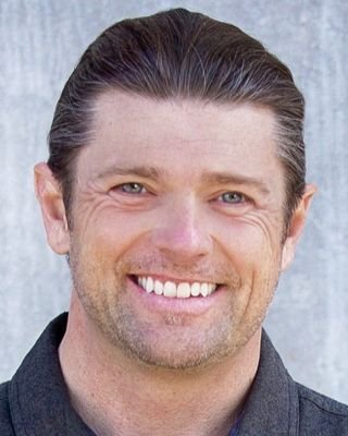 Aaron J. Thomas